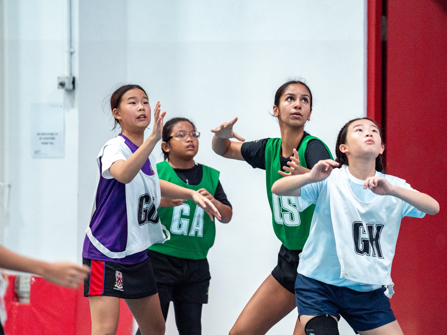 Elevate netball players practising positional play